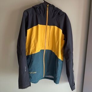 Flylow mens ski jacket; Blue, yellow, and grey striped